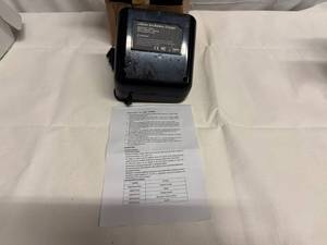 lot 2 image: Lithium Ion Battery Charger Model LCS36