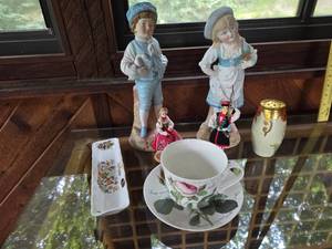 lot 81 image: Porcelain Figurine and Teacup Collection with Floral Accents