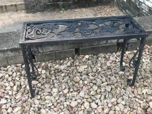 lot 5 image: Ornate Black Wrought Iron Outdoor Bench with Floral Design