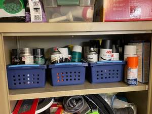 lot 250 image: Collection of Spray Paint Cans, Polyurethane, and Adhesives in Storage Baskets