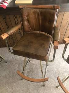 lot 353 image: Pair of Vintage Swivel Bar Stools with Brown Vinyl Upholstery and Wood Accents