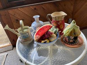 lot 71 image: Decorative Tabletop Collection with Ceramic Pitcher, Vase, Birdhouse, Faux Fruit, and Watering Can