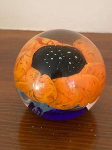 lot 156 image: Sabina Rymanow Handcrafted Glass Paperweight with Orange Floral Design