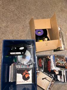 lot 398 image: Large Music Media Collection with CDs, Cassettes, and Vinyl Records