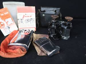 lot 57 image: VINTAGE BINOCULARS  JON-E HAND WARMERS