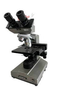 lot 29 image: Olympus CH Series CHB Laboratory Microscope With 3 Objectives - Binocular Head with Built-In Light Source, Fine Focusing Controls - Good Working Condition