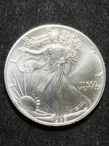lot 50 image: 1989 AMERICAN SILVER EAGLE 1 TROY OZ .999 FINE SILVER
