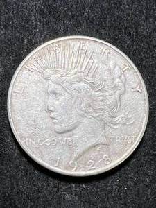 lot 55 image: 1928-S US PEACE SILVER DOLLAR