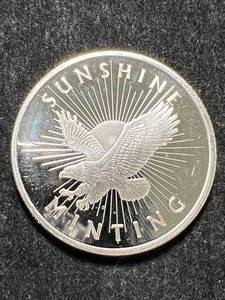 lot 58 image: 1 TROY OZ .999 FINE SILVER SUNSHINE MINTING ROUND