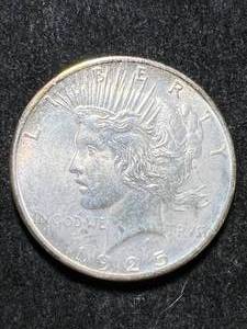 lot 75 image: 1925 US PEACE SILVER DOLLAR