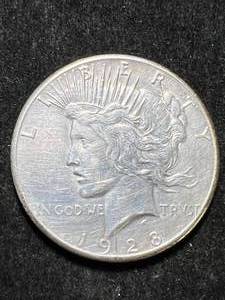 lot 83 image: 1928 US PEACE SILVER DOLLAR