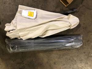 lot 24 image: Lot of Assorted Patio Umbrellas Various Models and Conditions Customer Returns See Pictures