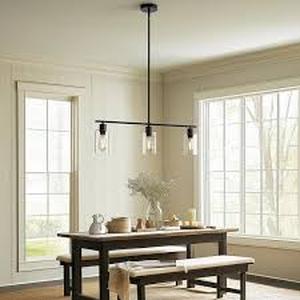 lot 29 image: YANSUN 3-Light Black Industrial Modern Linear Kitchen Island Pendant with Clear Glass Shades for Dining Table Customer Returns See Pictures