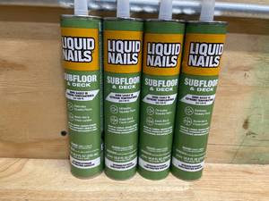lot 134 image: Lot of 4 - Liquid Nails 10 Oz Subfloor And Deck Construction Latex Adhesive