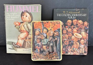 lot 64 image: Hummel Books and Metal Box