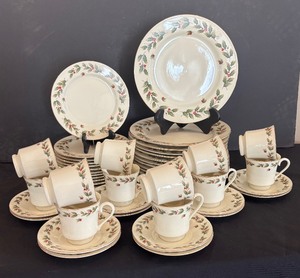 lot 107 image: Holly Berry Holiday Christmas Dinnerware Service for 12 by World Bazaars
