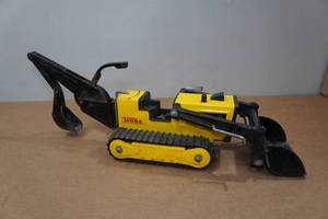 lot 41 image: Vintage Tonka Trencher Backhoe Tractor