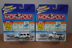 lot 118 image: 2 Johnny Lightning Monopoly Die Casts with Bonus Game Tokens
