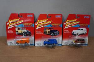 lot 127 image: 3 Johnny Lightning  Woodys & Panels Die Casts - Ford Delivery Vans and Chevy Wagon