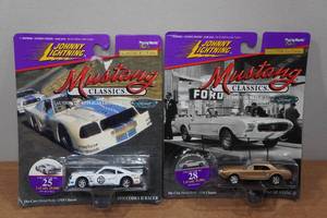lot 131 image: 2 Johnny Lightning Mustang Die Casts - 1975 Cobra & 1963 Mustang