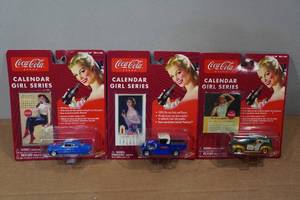 lot 142 image: 3 Coca-Cola Calendar Girl Series Die Casts - 49 Mercury, 42 Ford Model A & Sedan Delivery