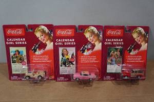 lot 143 image: 3 Coca-Cola Calendar Girl Series Die Casts -  Military Jeep, Chevy Bel Air, 41 Chevy Wagon