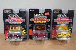 lot 159 image: 3 Racing Champions Mint Die Casts - 97 Ford Mustang