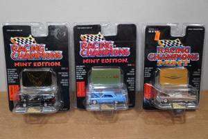 lot 165 image: 3 Racing Champions Mint Edition Die Casts - 96 Pontiac Firebird, 64 Chevy Impala SS, 59 Cadillac Eldorado