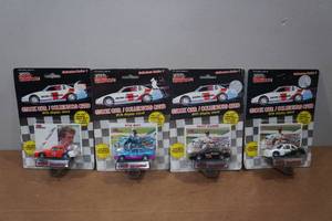 lot 187 image: 4 Racing Champions Stock CarsCollectors Cards with Stands