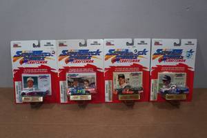 lot 192 image: 4 Racing Champions Super Truck Die CastsCollectors Cards with Stand