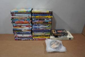 lot 243 image: Assorted DVDs and VHS - Alvin & the Chipmunks, HOP, Field of Dreams, Mr Deeds