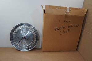 lot 263 image: Pontiac Hub Cap Clock - 14