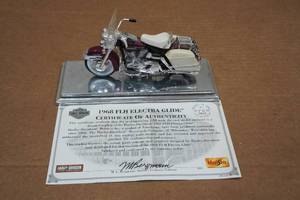 lot 309 image: Maisto Harley Davidson 1968 FLH Electra Glide 118 Scale Model