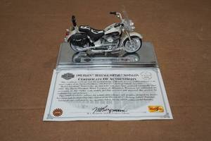 lot 313 image: Maisto Harley Davidson 1993 FLSTN Heritage Softail Nostalgia 118 Scale Model
