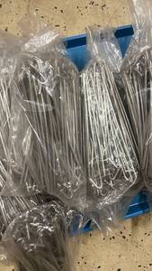 lot 148 image: Bulk Lot of Metal Tent Stakes in Plastic Bags