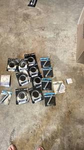 lot 283 image: Group of U-Bolt Clamps and Snowplow Parts including Dynomax, Carquest, and Snowplow Rivets