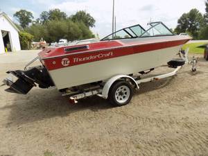 lot 3 image: 1991 Thunder Craft Boat with OMC Cobra 4.3 liter & Karavan Roller Trailer