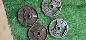 lot 26 image: Lot of four 2.5LB one-inch Weight Plates (USED)