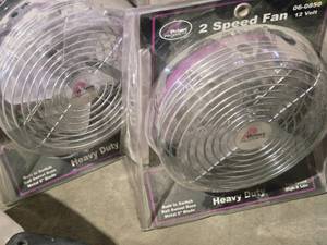 lot 153 image: Lot of (2) 7 Fans  12 Volt  2 Speed  Heavy Duty (in original packaging)