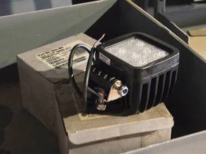 lot 242 image: Peterson LED Work Light  Flood Beam 2520 Lumens  10-30 Volts DC 3 34 x 3 34 (in original packaging)