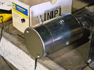 lot 287 image: National Liftgate Parts AMT0100 (9 Spline  CW  One Terminal) Lift Gate Motor (in original packaging)