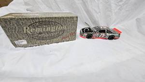 lot 18 image: Action 124 Remington Mossey Oak-#75-Rick Mast-Opening Hood and Trunk
