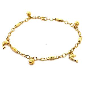 lot 25 image: Jumping Dolphin & Ball Charm Bracelet in 14k Yellow Gold