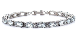lot 24 image: NEW 12.25 Carat Oval Aquamarine & Natural Diamond Tennis Bracelet