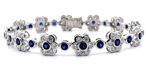 lot 5 image: 9.36 Carat Blue Sapphire & Diamond Cluster Flower Bracelet