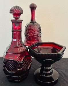 lot 59 image: Vintage Avon1876 Cape Cod Ruby Glass including Wine Decanter, Footed Candy Dish and Bell