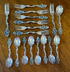 lot 4 image: Set of 12 Norwegian 830S Silver Demitasse Spoons and Relish Forks
