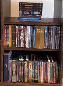 lot 131 image: Dozens of DVDs including Titanic, Friday Night Lights, Little Women and More