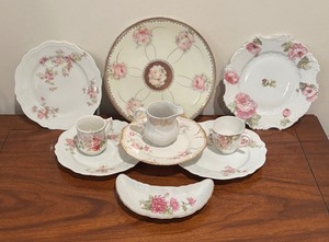 lot 192 image: Pretty Pink Floral Vintage Plates, Demitasse Cups and Creamer Pitcher by Weinman, Haviland Limoges of France, Royal Austria and More
