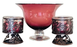 lot 114 image: Set of Ruby Red Glass Bowl and Two Decorative Candle Holders